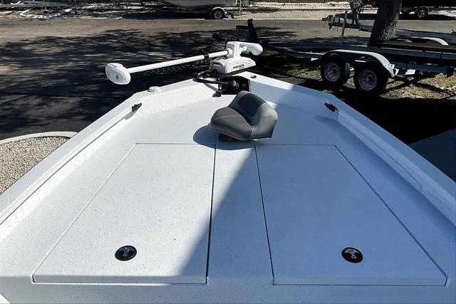Slide: The Image of 2025 Xpress Boats H210 BAY deck with seating and trolling motor. - 21