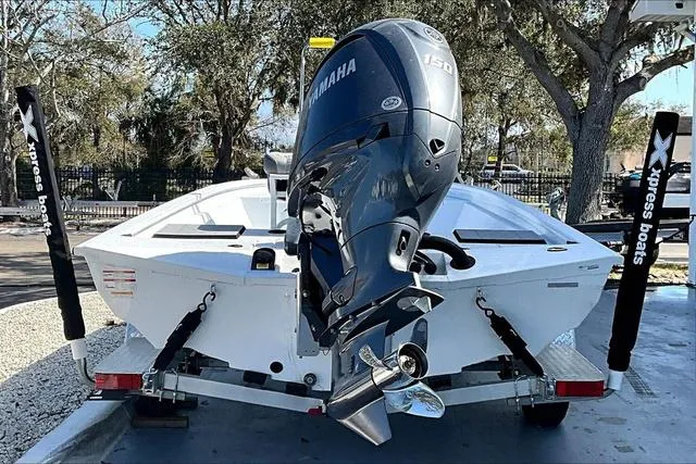 Slide: The Image of 2025 Xpress Boats H210 BAY with Yamaha engine on trailer. - 5