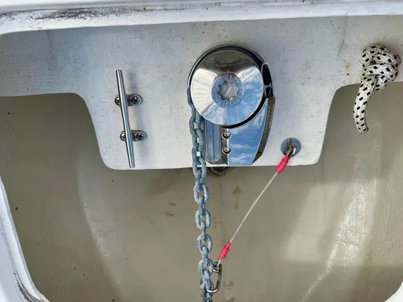 Slide: The Image of Anchor windlass on 2021 Prowler 31 boat with chain and cleat. - 14