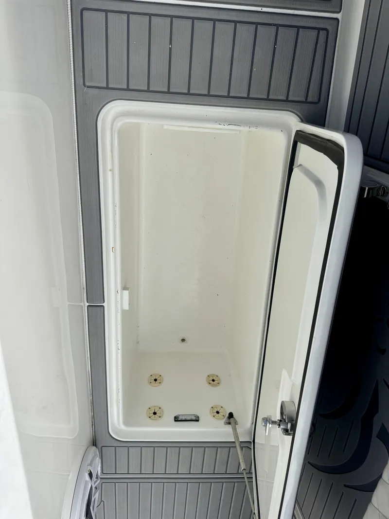 Slide: The Image of Open storage compartment on 2021 Prowler Prowler 31 boat deck. - 16