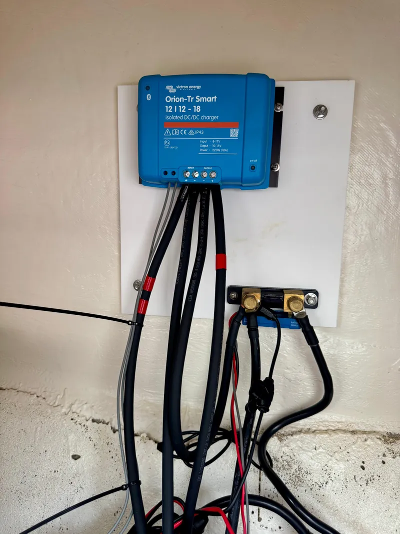 Slide: The Image of Blue Orion-Tr Smart charger with connected cables in a Prowler 31, 2021 model. - 20