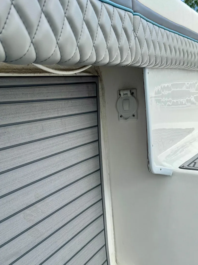 Slide: The Image of 2021 Prowler 31 boat interior with quilted upholstery and sleek paneling. - 34