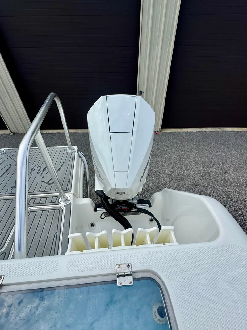 Slide: The Image of 2021 Prowler 31 boat with outboard motor and deck view. - 39