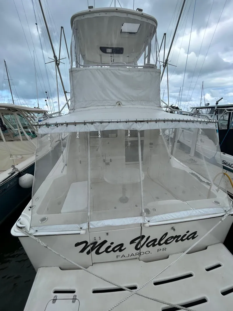 Slide: The Image of 2002 Riviera Convertible 37 boat docked, named "Mia Valeria," in Fajardo, Puerto Rico. - 16