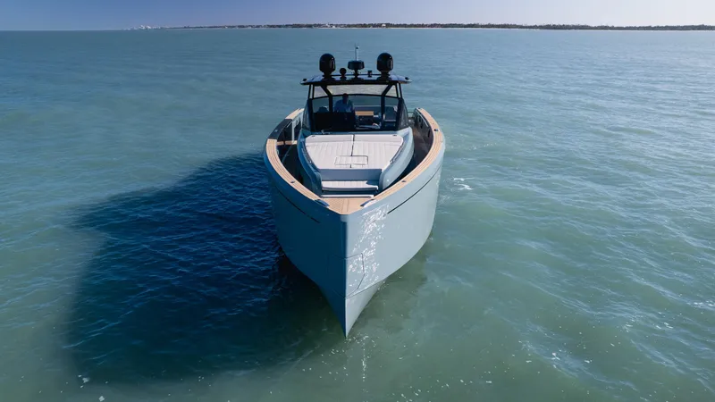 Slide: The Image of 2025 Pardo Yachts P50 cruising on calm blue waters, front view. - 8