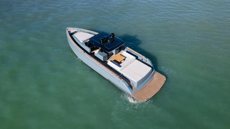 Slide: The Image of 2025 Pardo Yachts P50 luxury yacht cruising on calm blue waters. - 10