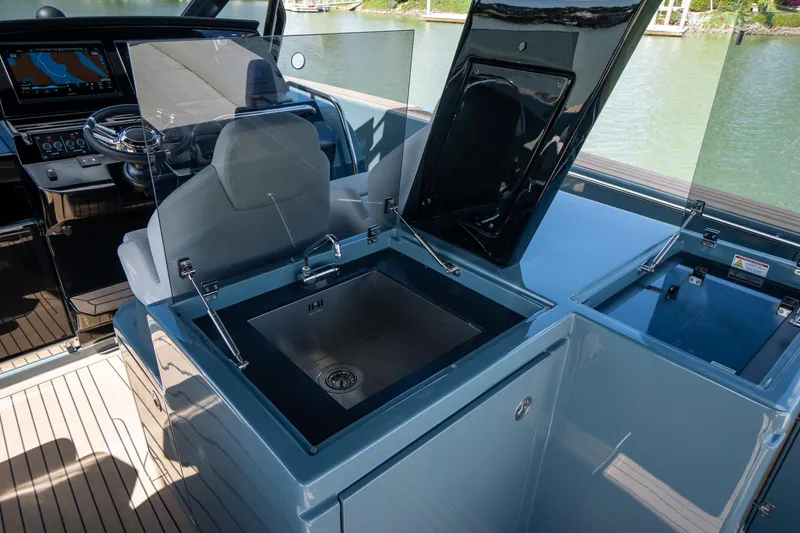 Slide: The Image of Pardo Yachts P50 2025 model featuring a sleek onboard kitchen sink area. - 27