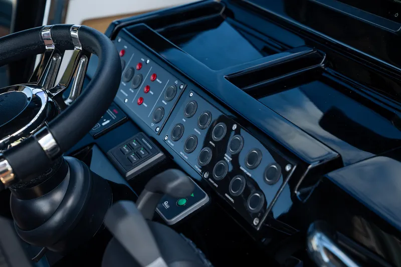 Slide: The Image of Helm controls of 2025 Pardo Yachts P50, featuring sleek design and advanced technology. - 38