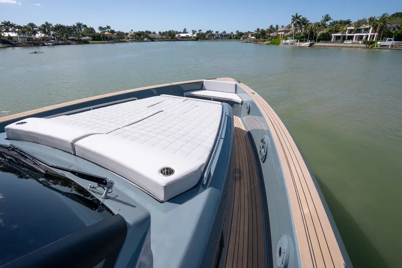 Slide: The Image of 2025 Pardo Yachts P50 luxury yacht with sunbed on calm water. - 50