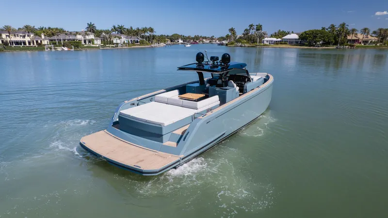 Slide: The Image of 2025 Pardo Yachts P50 cruising on a serene lake with clear blue skies. - 6