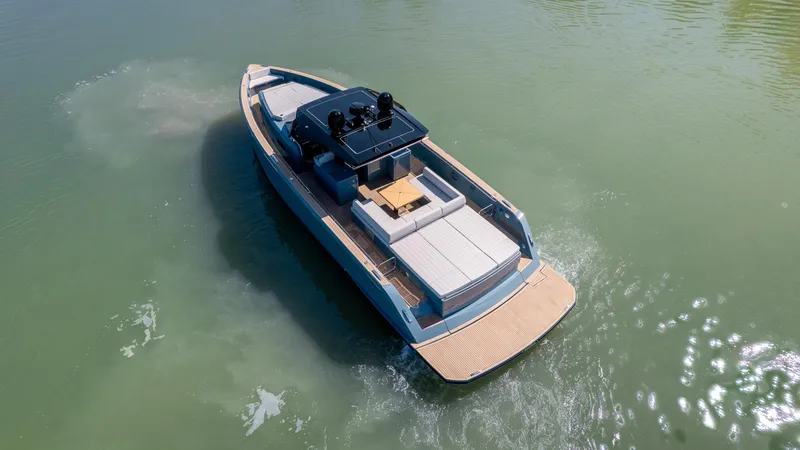 Slide: The Image of 2025 Pardo Yachts P50 cruising on calm waters, showcasing sleek design and spacious deck. - 9
