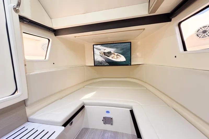 Slide: The Image of 2024 Scout 377 LXF cabin interior with TV and seating. - 38