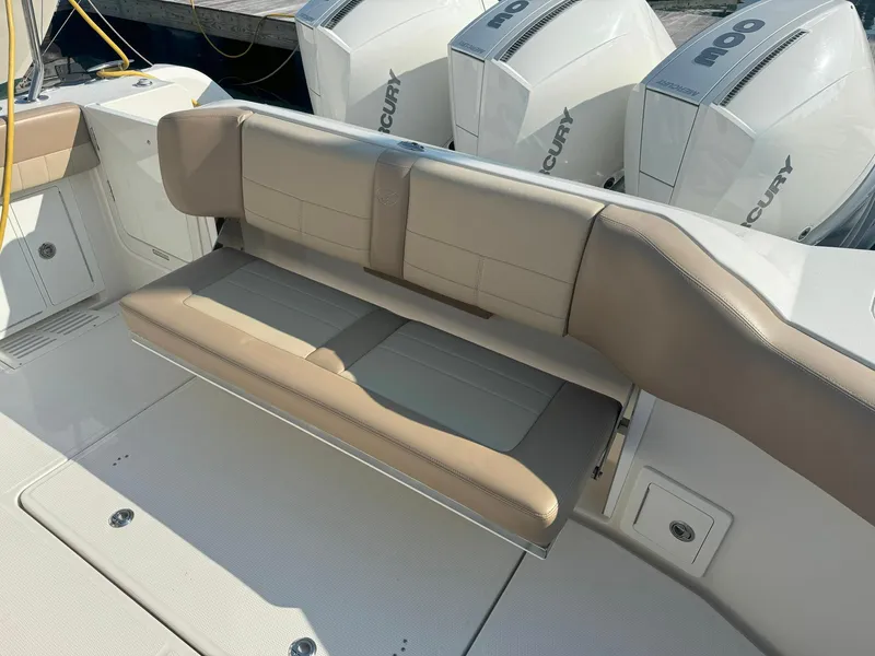 Slide: The Image of 2019 Sailfish 360 CC boat with foldable seating and Mercury engines. - 14