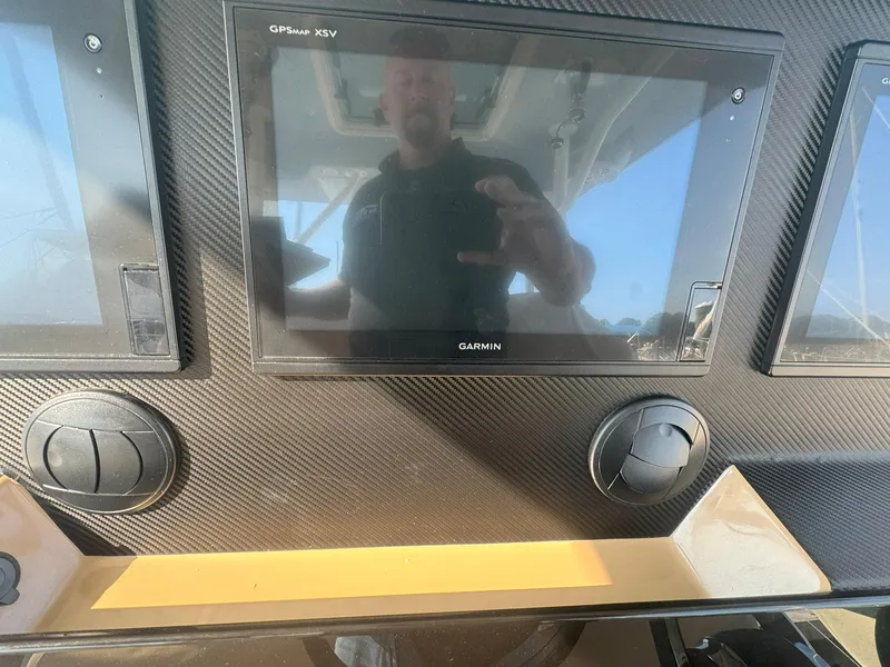 Slide: The Image of 2019 Sailfish 360 CC dashboard with Garmin GPSmap XSV display. - 35