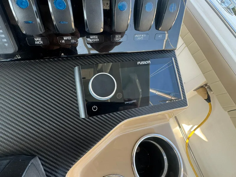 Slide: The Image of Control panel of 2019 Sailfish 360 CC boat with Fusion stereo system. - 36