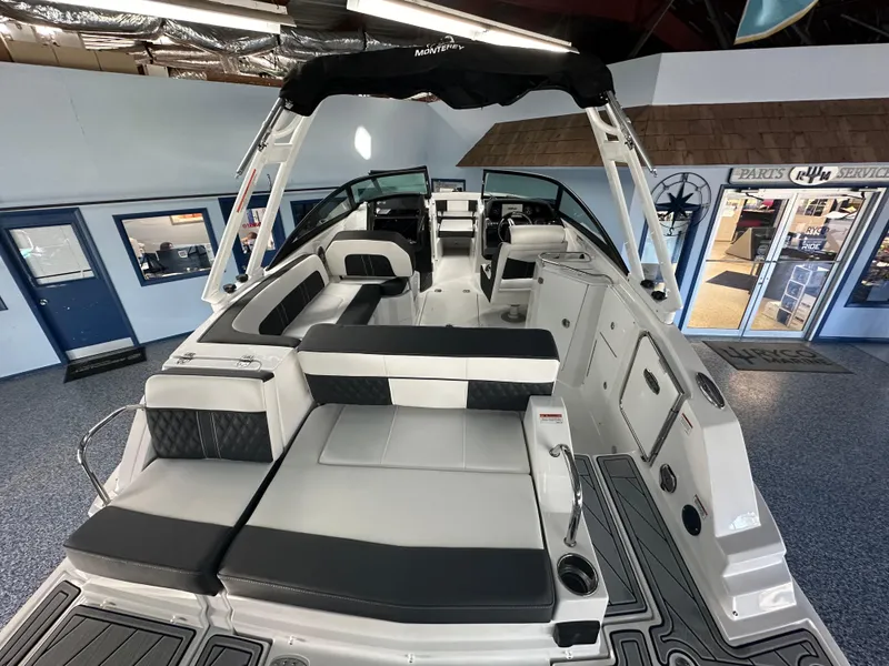 Slide: The Image of 2025 Monterey M45 boat interior with seating and storage compartment. - 13
