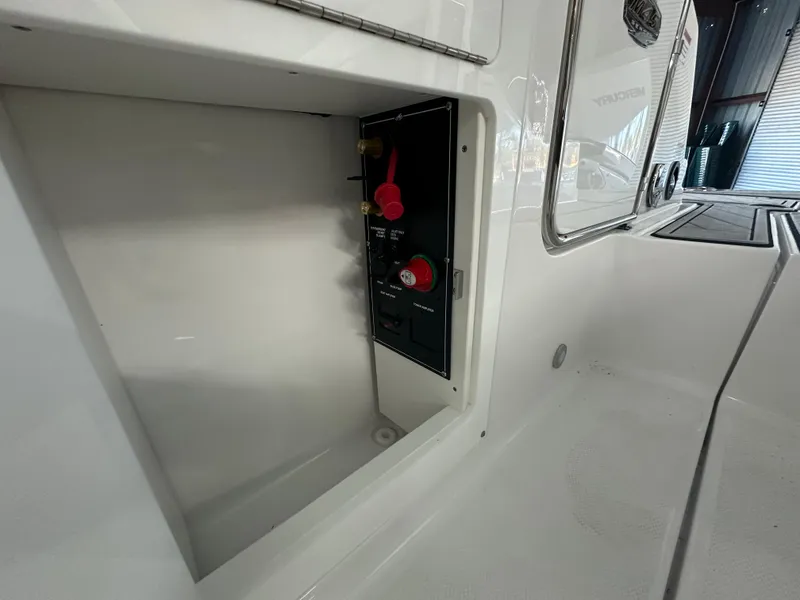 Slide: The Image of 2025 Monterey M45 boat interior with modern dashboard and seating. - 23