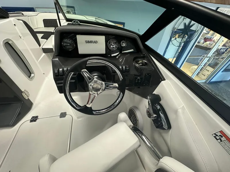 Slide: The Image of Throttle control lever on a 2025 Monterey M45 boat dashboard. - 26
