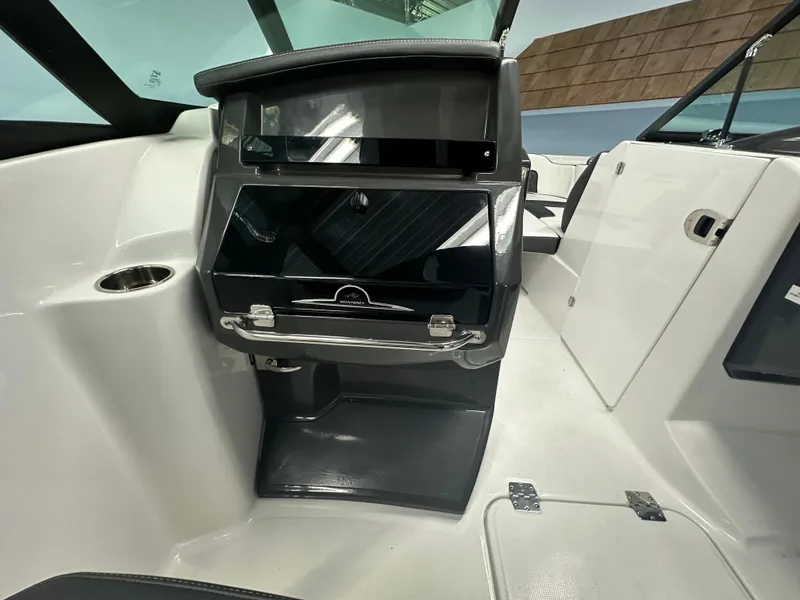 Slide: The Image of 2025 Monterey M45 boat interior with open cabin door and visible toilet. - 30