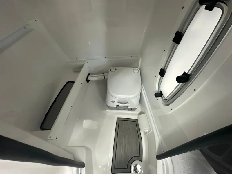 Slide: The Image of 2025 Monterey M45 storage compartment with organized shelving and secure hatch. - 32