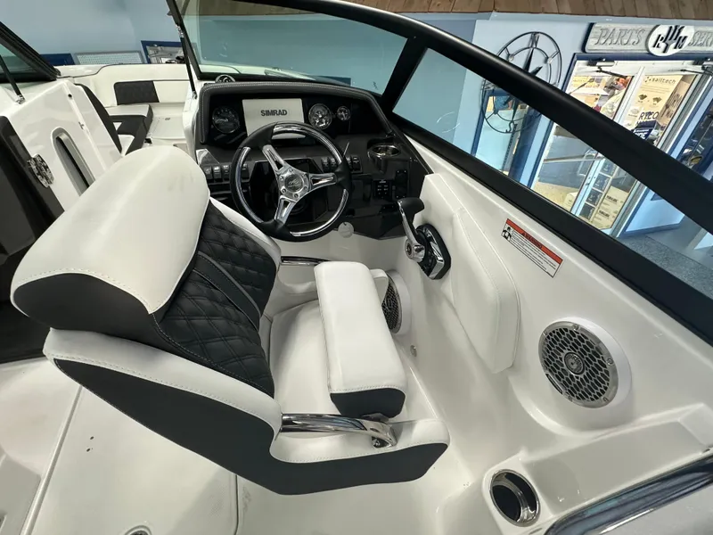 Slide: The Image of 2025 Monterey M45 boat with Mercury 300 V8 engine in showroom. - 47