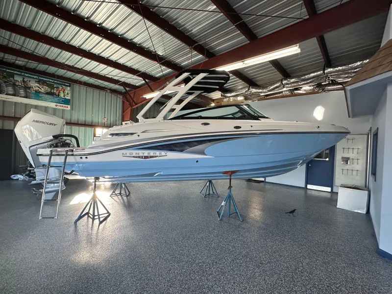 Slide: The Image of 2025 Monterey M45 boat with 300 VB engine displayed indoors. - 7