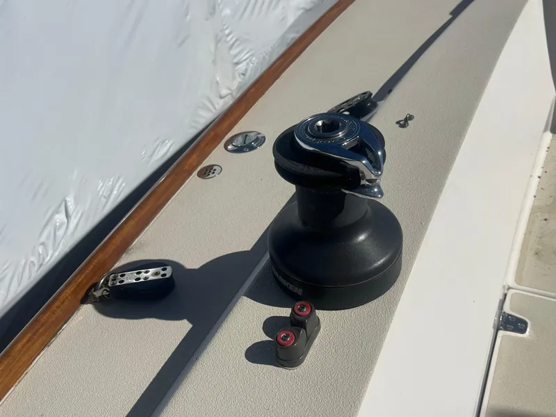 Slide: The Image of Deck of 2005 J Boats J/100 sailboat with winch and cleat. - 27