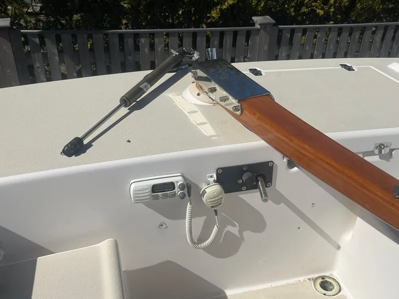 Slide: The Image of 2005 J Boats J/100 cockpit with wooden tiller and communication equipment. - 28