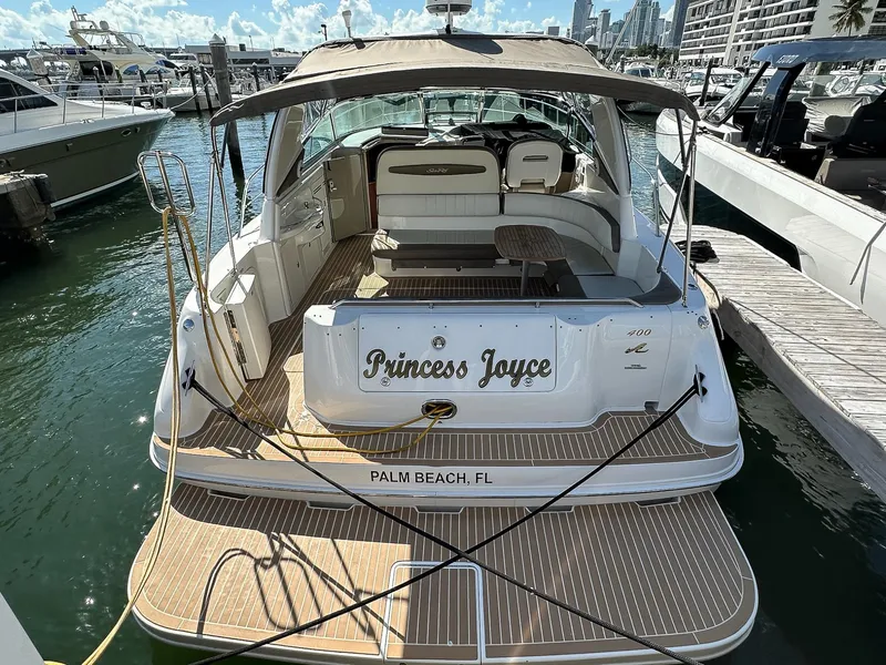 Slide: The Image of 1999 Sea Ray 400 Sundancer yacht docked in Palm Beach marina. - 4