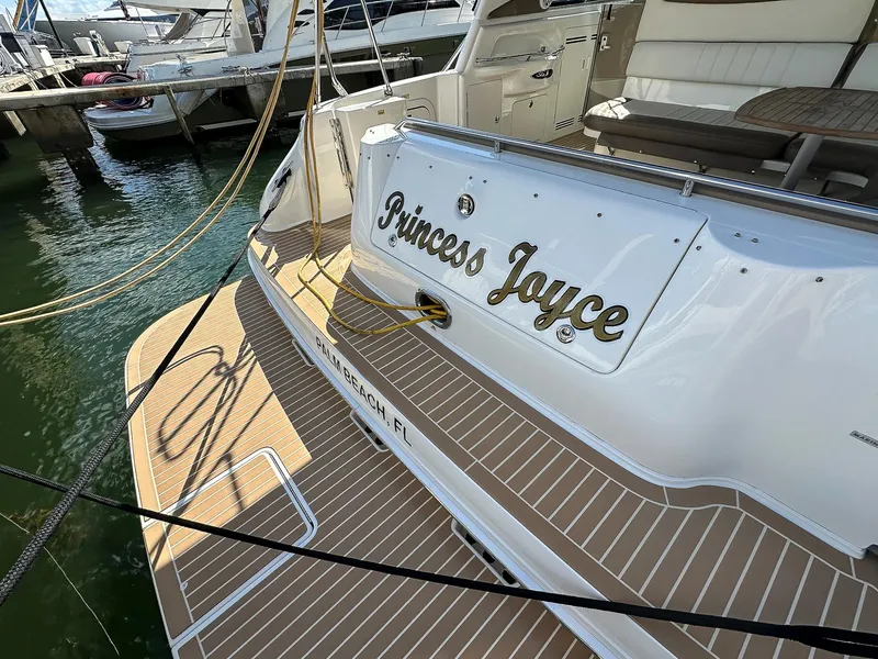 Slide: The Image of 1999 Sea Ray 400 Sundancer yacht named "Princess Joyce" docked in Palm Beach, FL. - 8