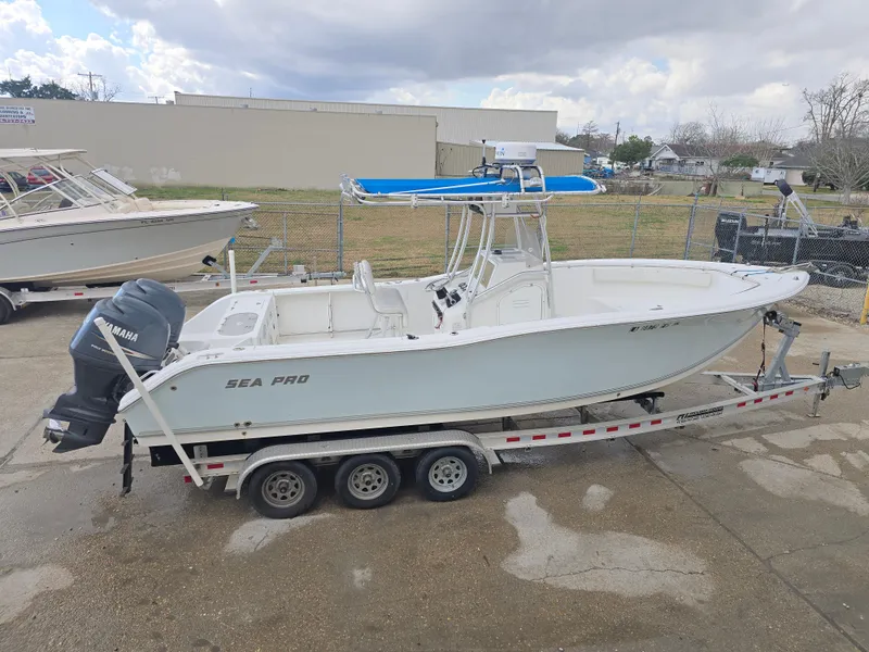 Slide: The Image of 2005 Sea Pro 270 Center Console boat on trailer with Yamaha outboard motor. - 13
