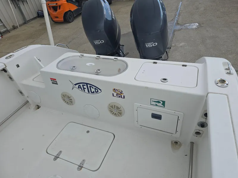 Slide: The Image of 2005 Sea Pro 270 Center Console boat with dual engines and branded decals. - 7