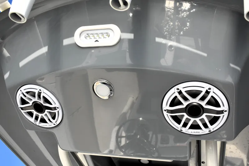 Slide: The Image of 2024 Pathfinder 2700 Open boat speakers and light on sleek gray panel. - 14