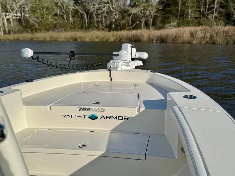 Slide: The Image of 2024 Pathfinder 2700 Open boat with Yacht Armor, on a calm river. - 17