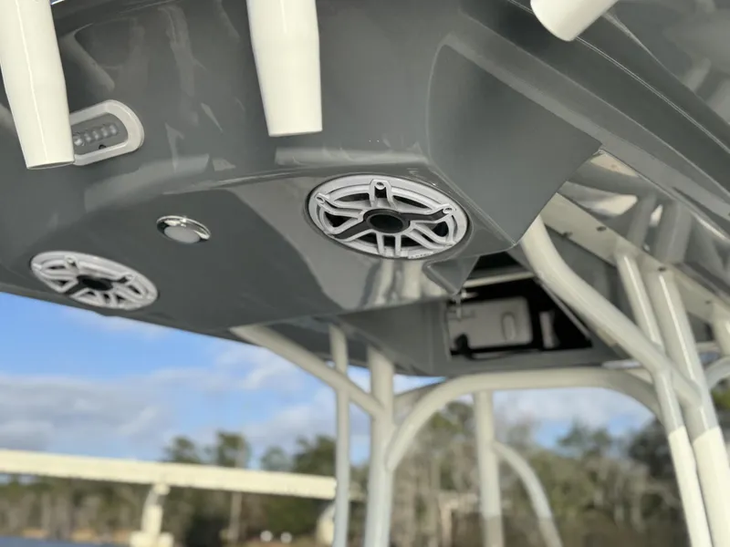 Slide: The Image of 2024 Pathfinder 2700 Open boat speakers and canopy detail. - 21