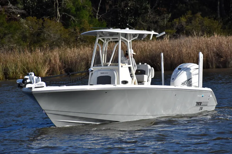 Slide: The Image of 2024 Pathfinder 2700 Open boat cruising on a calm river. - 5