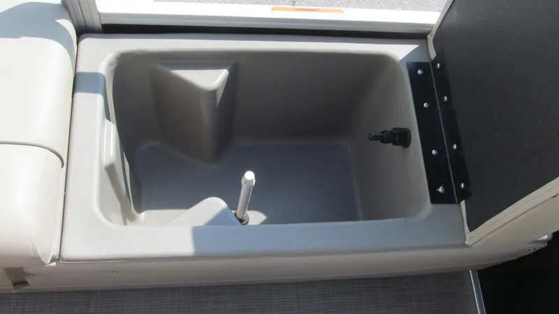 Slide: The Image of 2023 Sun Tracker SportFish 22 DLX livewell compartment with open lid. - 9