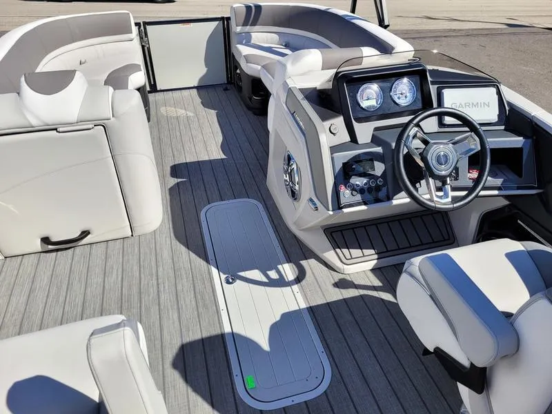 Slide: The Image of 2025 Avalon 2585 Catalina Quad Lounger interior with modern dashboard and seating. - 9
