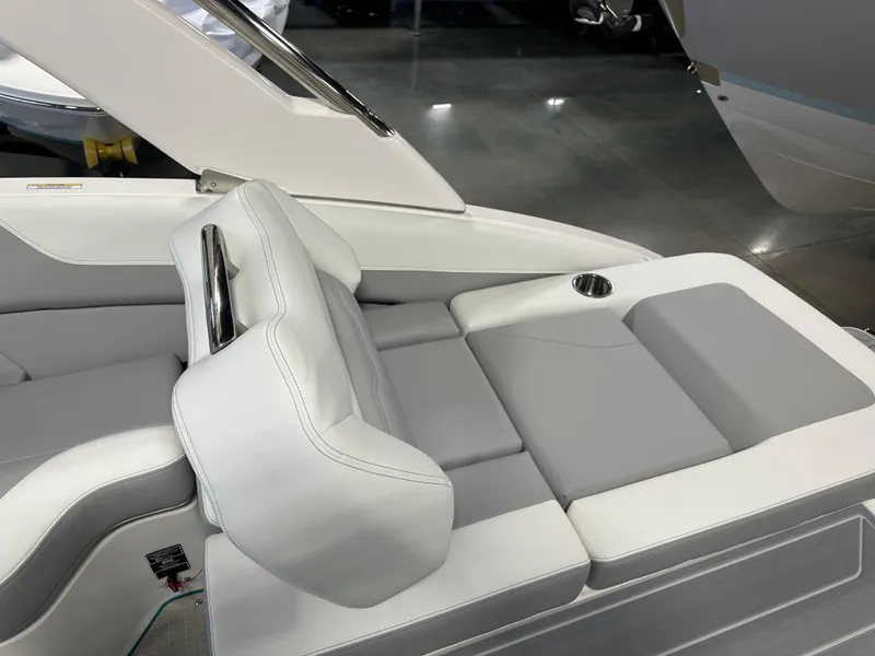 Slide: The Image of 2025 Regal LS6 boat interior with sleek gray and white seating. - 10