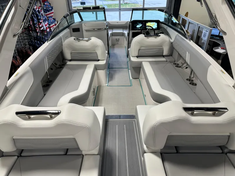 Slide: The Image of Luxurious interior of 2025 Regal LS6 boat with spacious seating and modern design. - 24