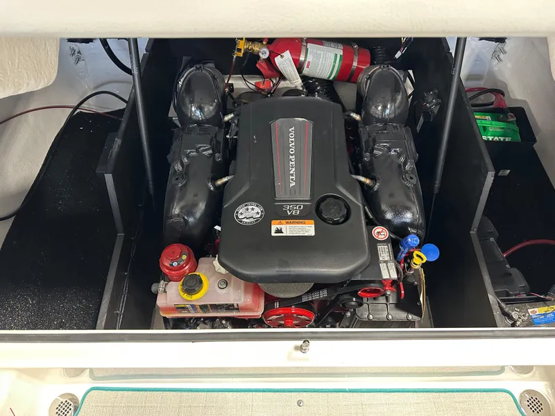 Slide: The Image of 2025 Regal LS6 engine compartment with V8 engine and fire extinguisher. - 7