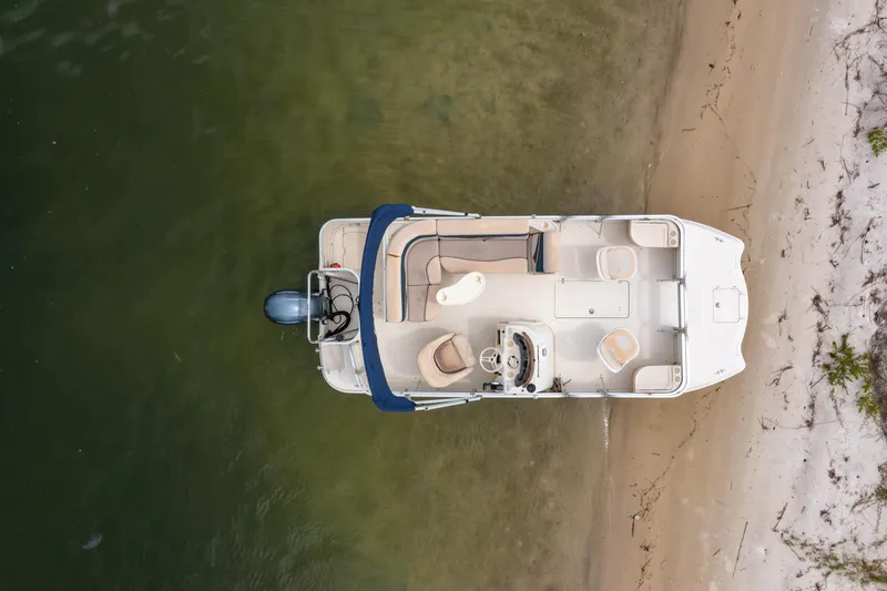 Slide: The Image of Overhead view of 2008 Bennington 201FS Southwind boat on sandy shore. - 13