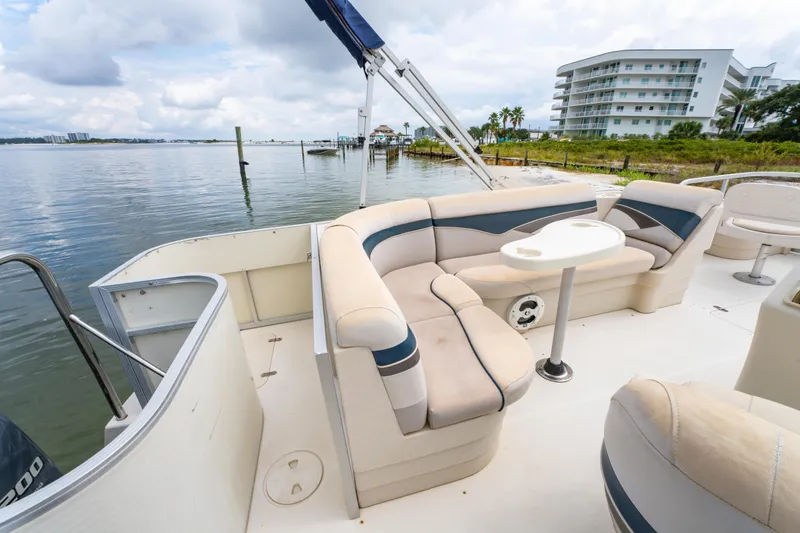 Slide: The Image of 2008 Bennington 201FS Southwind boat with spacious seating and scenic waterfront view. - 20
