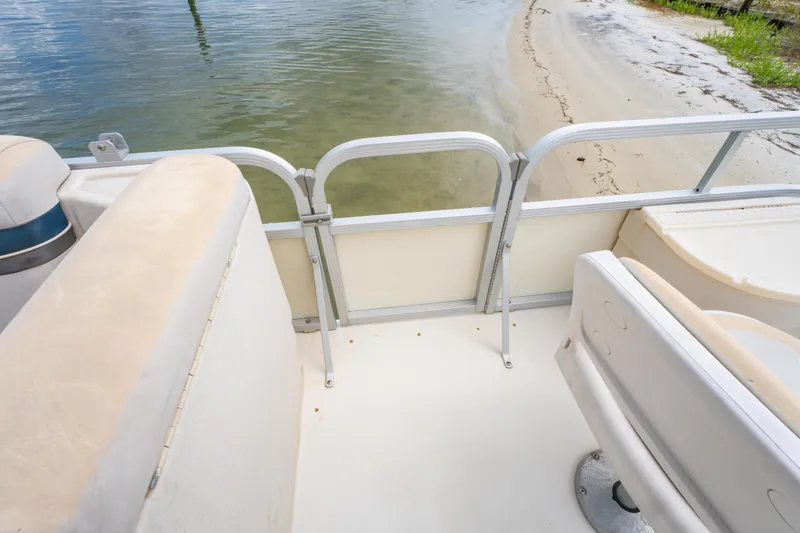 Slide: The Image of 2008 Bennington 201FS Southwind boat interior near sandy shoreline. - 29