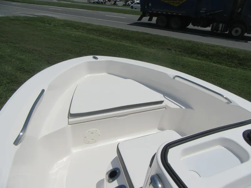 Slide: The Image of 2025 Robalo R160 Center Console boat interior with seating and storage. - 4