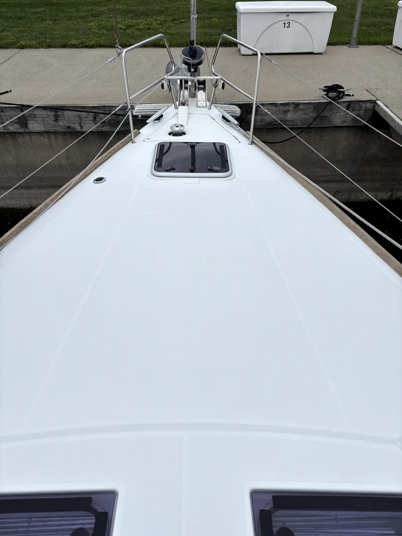 Slide: The Image of Bow view of 2018 Beneteau Oceanis 45 sailboat docked at marina. - 27