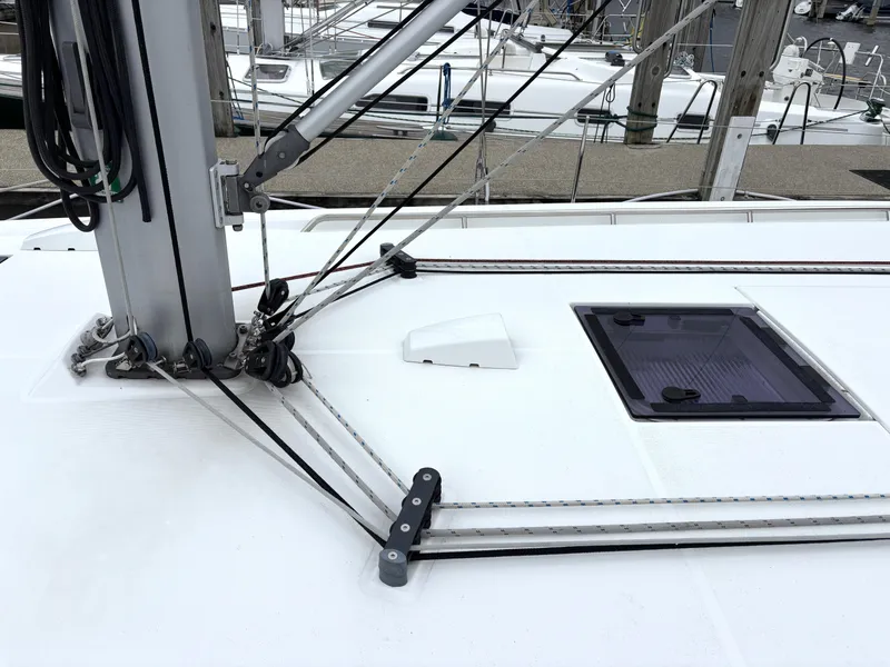 Slide: The Image of Deck of 2018 Beneteau Oceanis 45 sailboat with rigging and hatch details. - 36