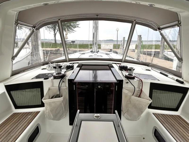 Slide: The Image of Cockpit of 2018 Beneteau Oceanis 45 sailboat with clear canopy and winches. - 40