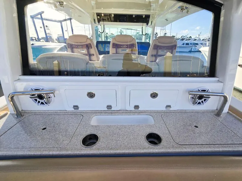 Slide: The Image of 2023 HCB Suenos boat interior with dual sinks and storage compartments. - 19