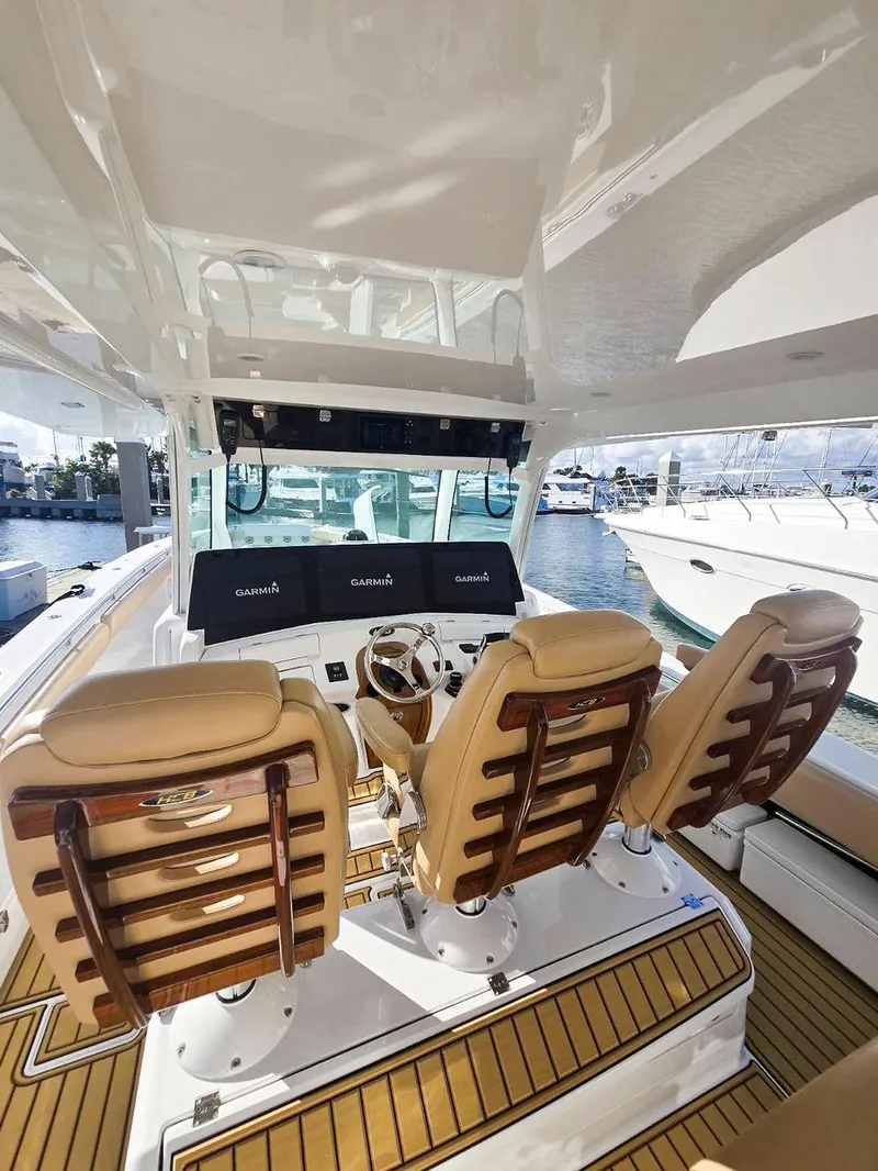 Slide: The Image of 2023 HCB Suenos boat interior with luxurious seating and wooden accents. - 25